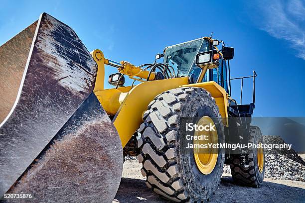 Heavy Equipment Machine Wheel Loader On Construction Jobsite Stock Photo - Download Image Now