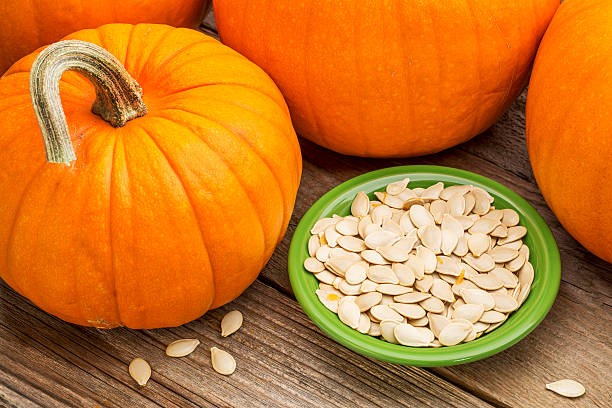 istock bowl of fresh pumpkin seeds 520736253