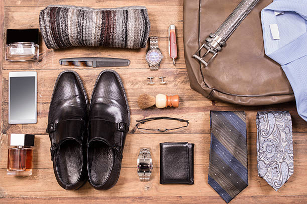 istock Men's accessories organized on table.  No people.  Knolling. 520736620