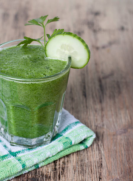 istock Smoothie of cucumber, parsley and celery. 520736753