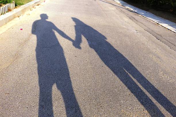istock Shadow couple in love 520737035