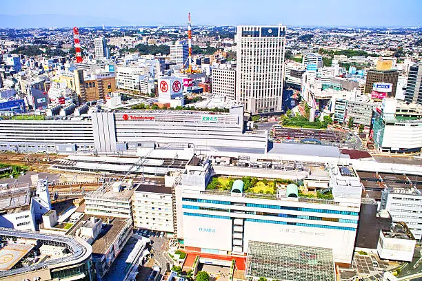 Yokohama Station West area. Station, bus terminal, taxi stand, hotels, commercial buildings.