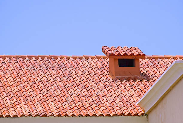 istock Tiled roof with chimney 520737711