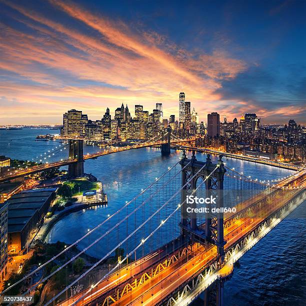 New York City Sunset With Manhattan And Brooklyn Bridge Stock Photo - Download Image Now