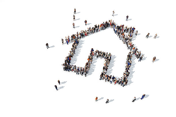 Group of people forming a house icon Large collection of people grouped together to form a house icon estate agency stock pictures, royalty-free photos & images