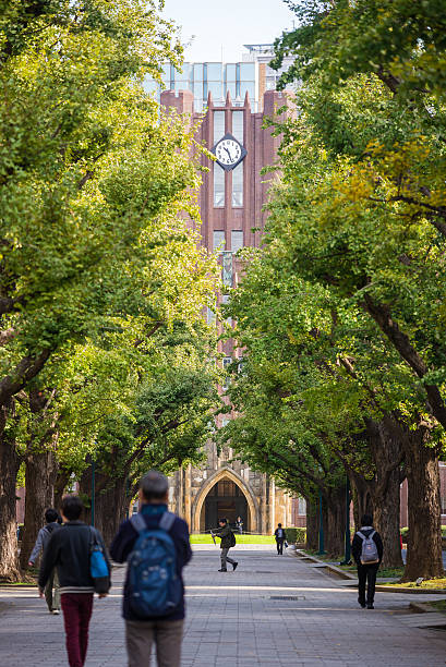 Tokyo, Japan - November 13, 2015: People walking in front path of Tokyo University building