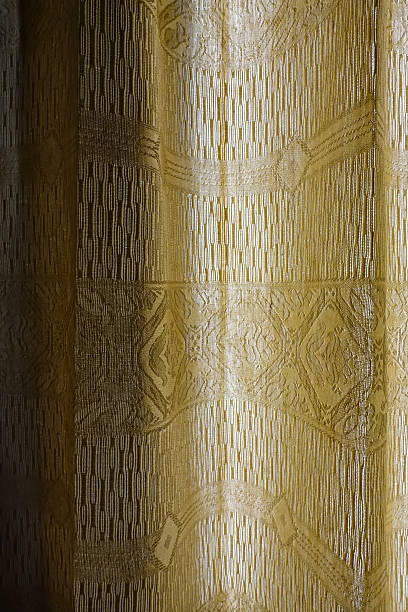 istock The light vintage gold curtain 520743456