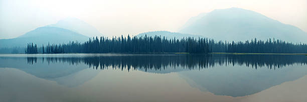 istock Foggy mountain lake 520746898