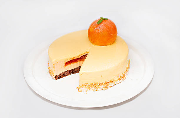 istock Apricot cake with a fruit on white plate 520747726