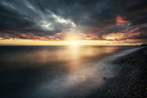 Sunset on sea. Stock photo