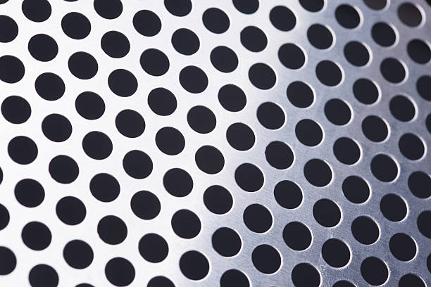 istock Metal background with holes 520752051
