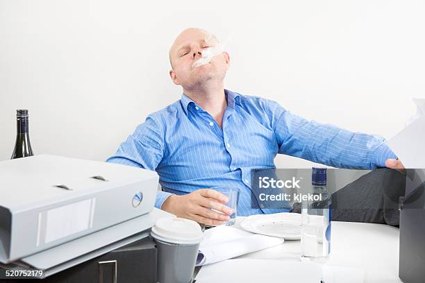 Businessman Smokes And Drinks At The Office Stock Photo - Download Image Now - Achievement, Adult, Adults Only