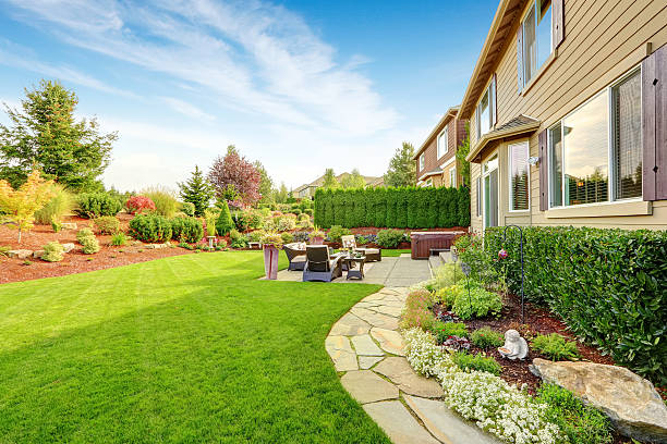 istock Luxury house exterior with impressive backyard landscape design 520757239