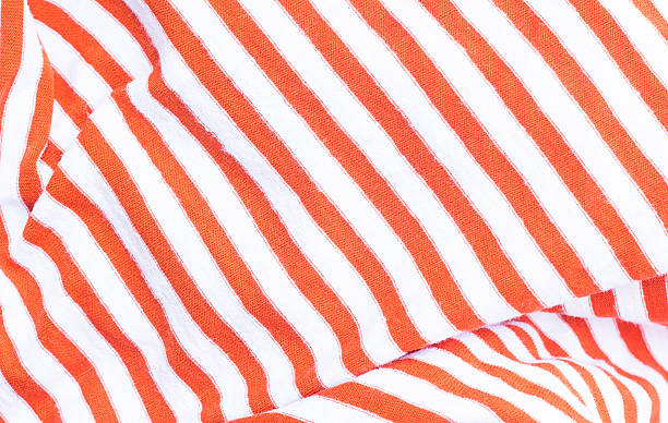 istock Red striped texture on the fabric 520757333