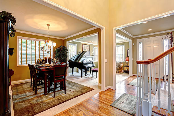 Luxury house interior with open floor plan Luxury house interior with open floor plan. Dining area and living room with grand piano expensive grand piano stock pictures, royalty-free photos & images