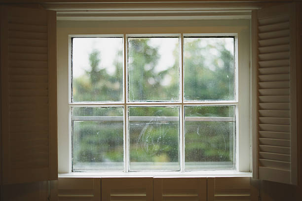 istock Wooden Sash Window And Shutters From Inside 520758535