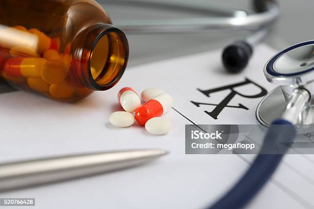 Prescription Lying On Table With Stethoscope Stock Photo - Download Image Now - Application Form, Assistance, Capsule - Medicine