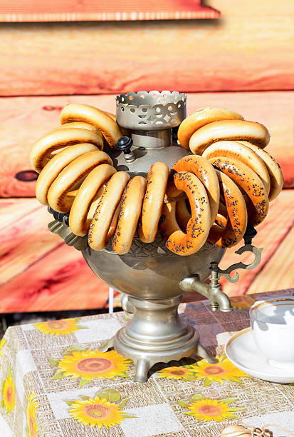 istock Traditional Russian tea from Samovar with bagels 520766786
