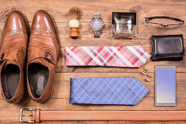 istock Men's accessories organized on table.  No people.  Knolling. 520767202