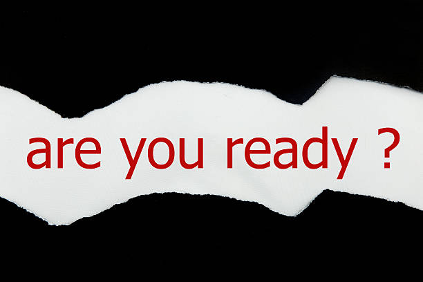 istock The question Are You Ready appearing behind black torn paper 520767772