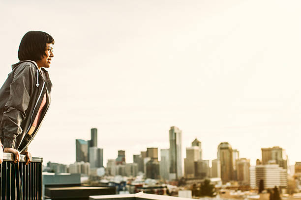 istock Asian Woman On Seattle Rooftop with Skyline 520769652