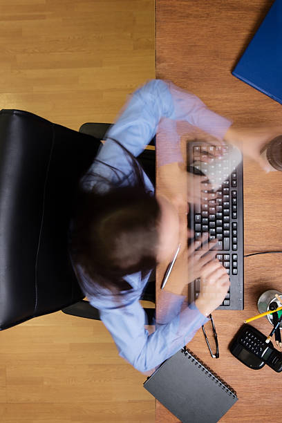 istock woman working at desk shot from above 520769951