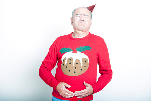 istock Senior Adult Man indicating that he is full up 520770823