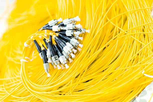 istock bundle of telecom cables on the floor of data center 520771611