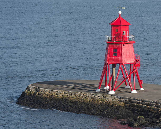 istock Red Lighthouse close to harbor of Newcastle upon Tyne, UK 520772007