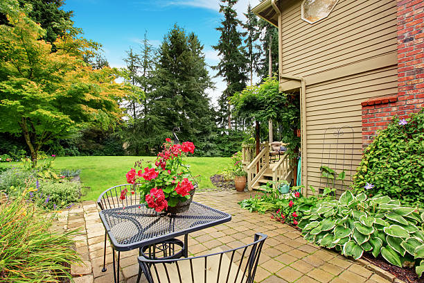 istock Walkout patio with table set and flower pot 520772633