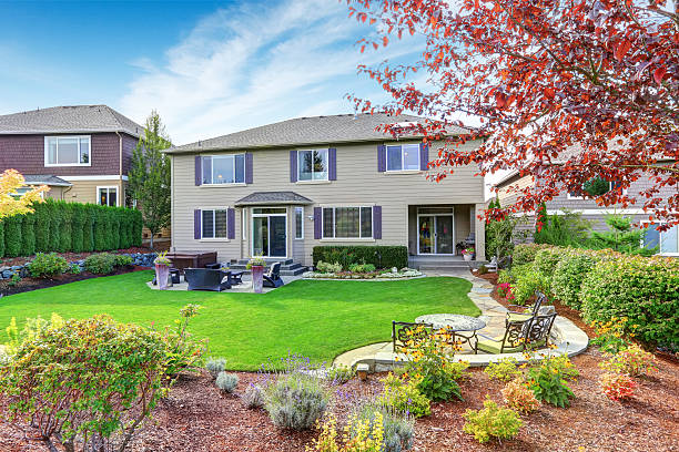 istock Luxury house exterior with impressive backyard landscape design 520773037