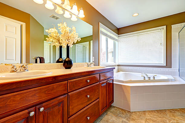 istock Luxury bathroom interior with corner bath tub 520773747