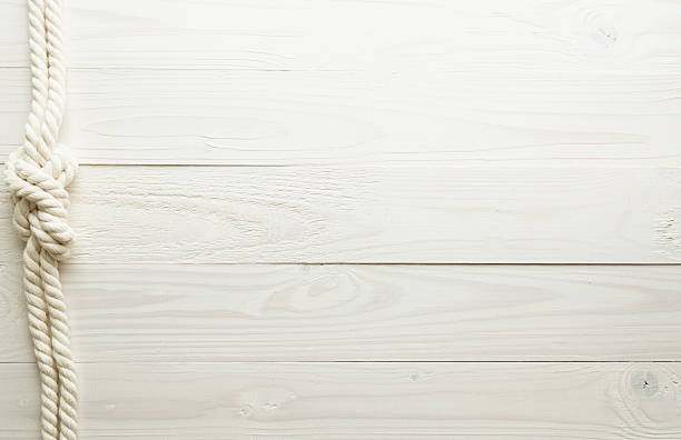 Sea knot on white wooden background