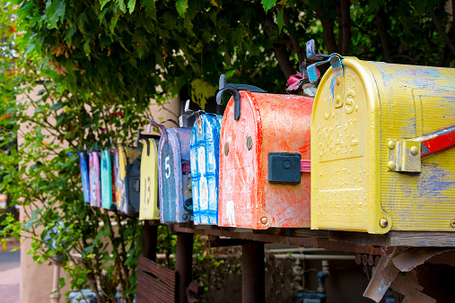 Two Colorful Old-Fashioned Rural US Mailboxes Close-Up. Shot in Santa Fe, NM.