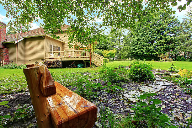 istock Backyard outdoor rest area with wooden bench 520776147