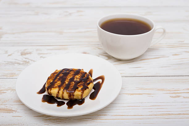 istock Cup of coffee and pancakes 520777468