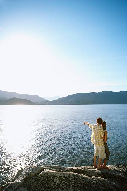 istock Couple beside a lake 520779246