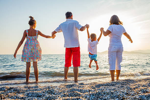 istock Family at the beach 520779382