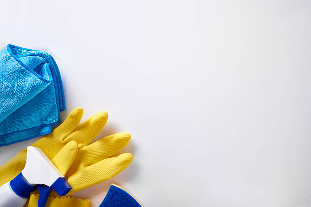 Professional cleaning equipment on white table top view isolated