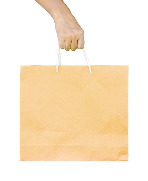 istock man holding a shopping recycle bag. 520786479