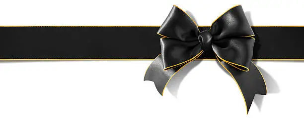 Photo of Double bow gold rimmed black ribbon with clipping path