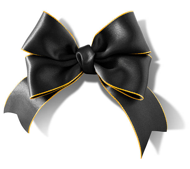 istock Double bow gold rimmed black ribbon with clipping path 520786885