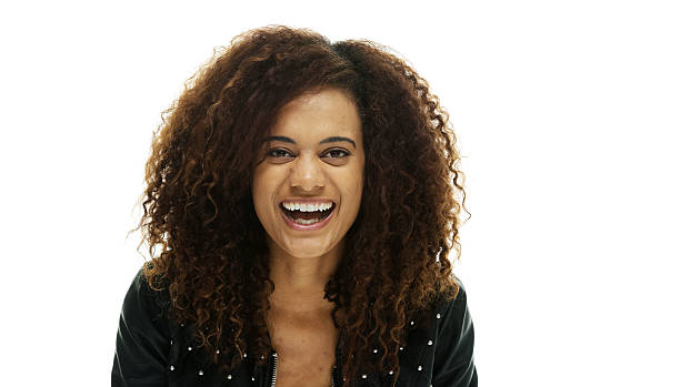 istock Cheerful woman in leather jacket looking at camera 520787087