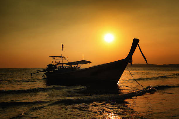istock long boat railay Krabi at sunset, Thailand 520790577