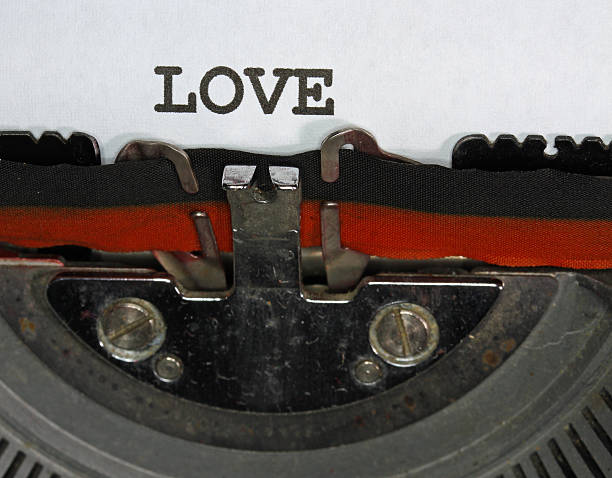 istock LOVE  written with black ink with the typewriter 520792557