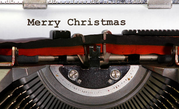 istock MERRY CHRISTMAS written with black ink with the typewriter 520792879