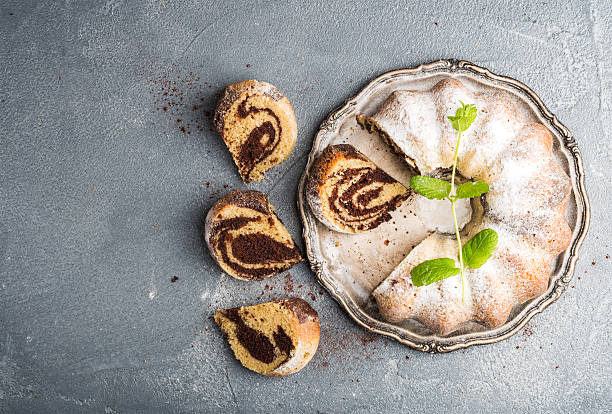 istock Zebra bundt cake cut into pieces and mint leaves 520794106