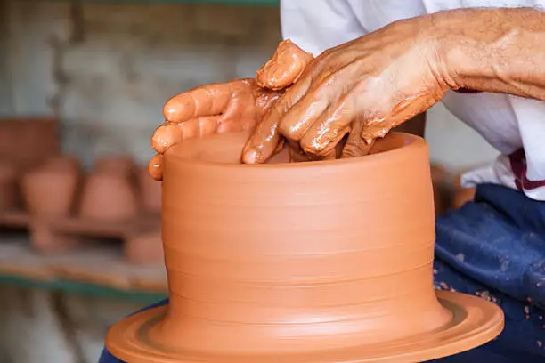 A potter making a pot at his workshop in Camaguey, Cuba