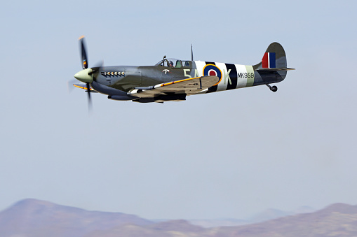 Los Angeles, California,USA-March 19, 2016. Vintage WWII Spitfire airplane flying at 2016 Los Angeles Air Show in Lancaster, California. The 2016 Los Angeles Air Show features the Navy Blue Angels and military aircraft.