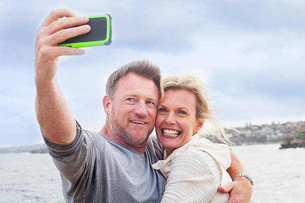 istock Happy mature couple taking a selfie 520795794